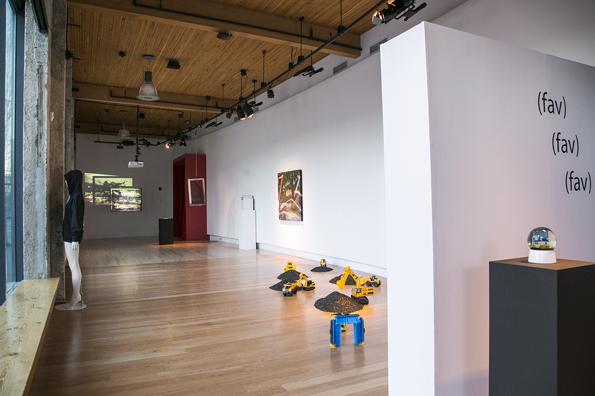 Daytime view of artworks by D.K. Pan, Christopher Paul Jordan, and RYAN! Feddersen installed at Hedreen Gallery