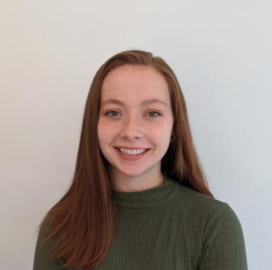 portrait of chloe wearing a green shirt