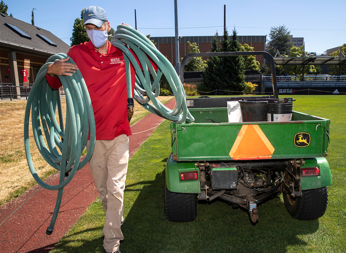 person maintaining athletic field