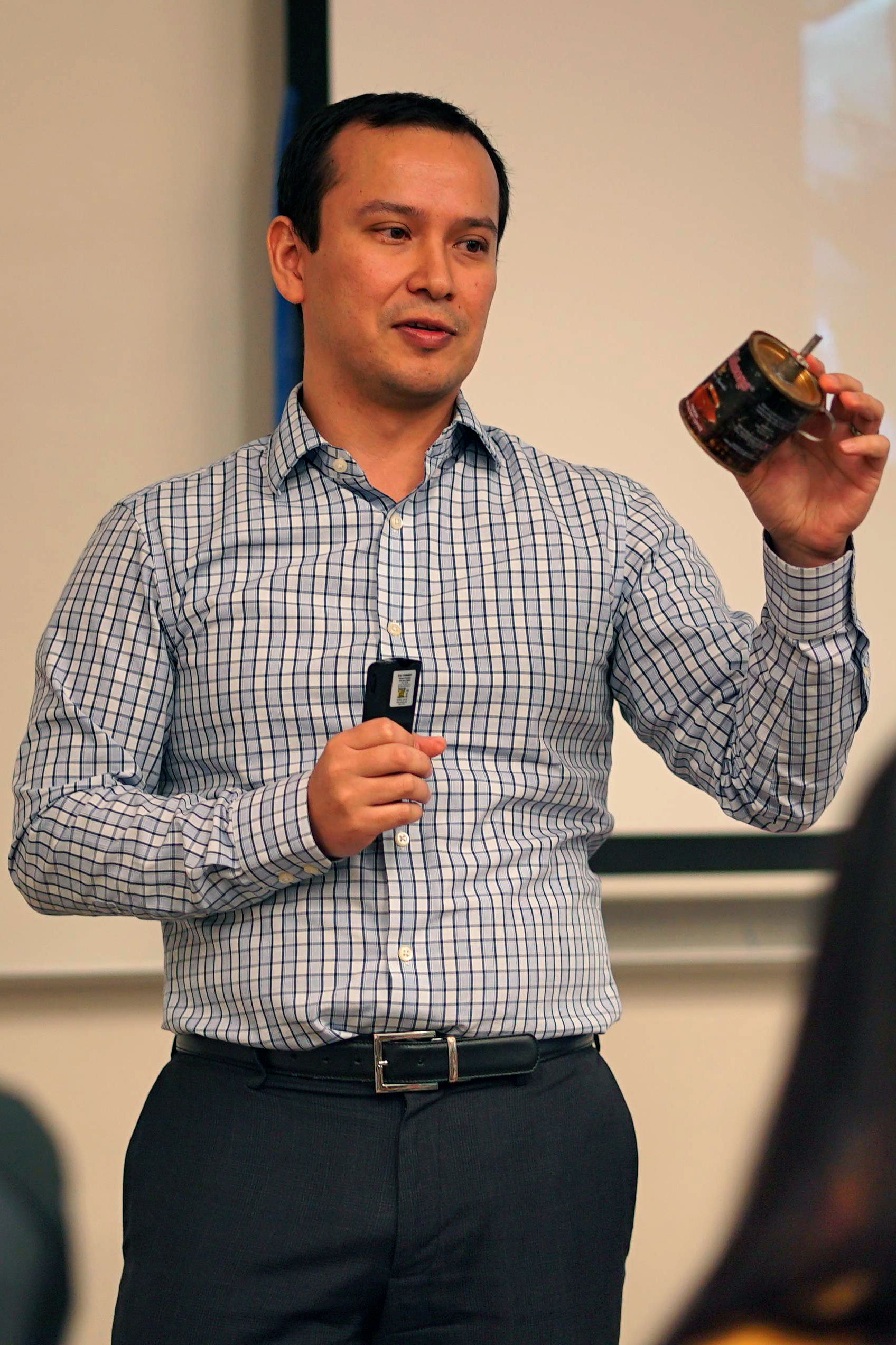 Henry speaking during a lecture.