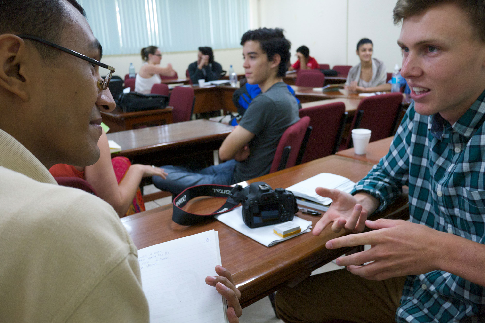 UCA student and SU student discuss field work