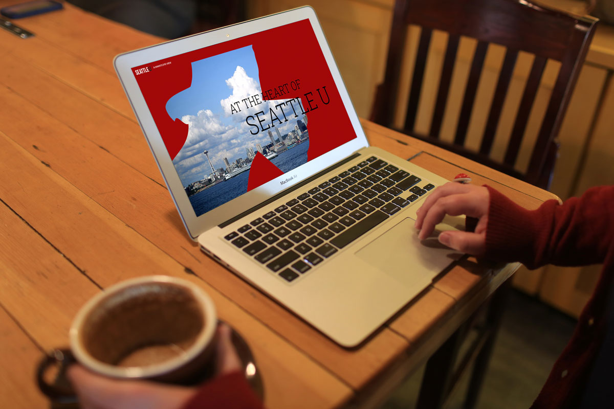 a prospective student views the home page of the viewbook on her laptop