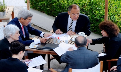 People holding a discussion around a table