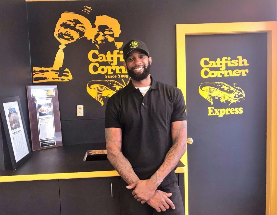 A man standing in front of a counter