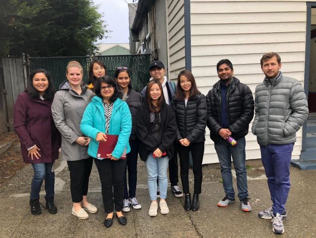 Group of people standing outside a building