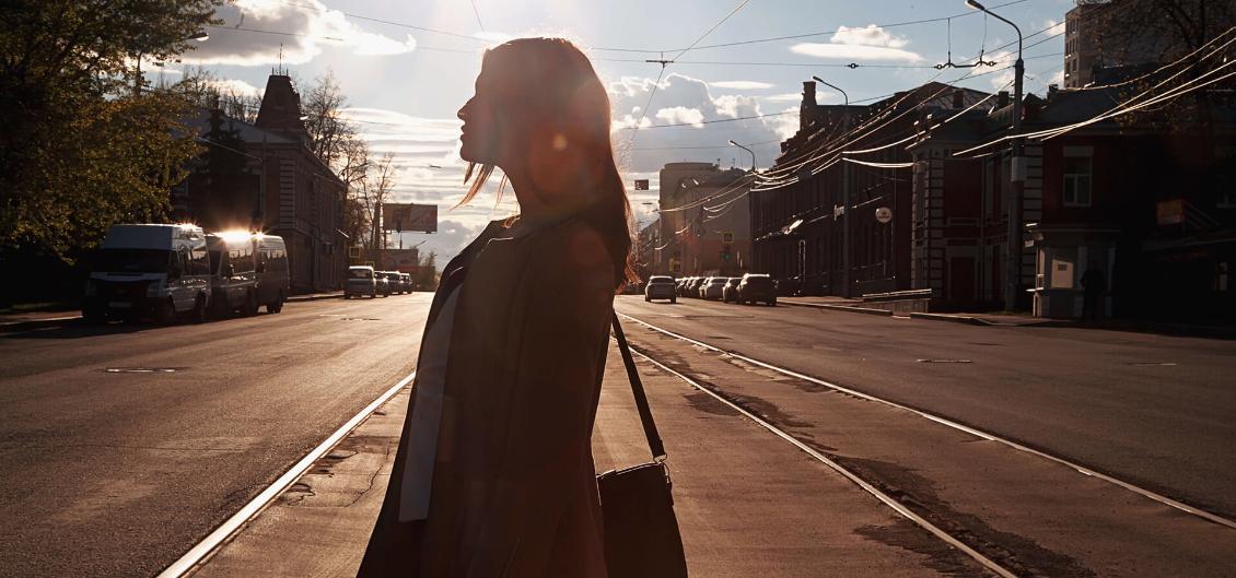 Silhouette of woman on street