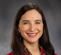 A profile photo of Rebecca Saldaña, ’99