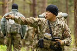 Cadet outside in greens field training