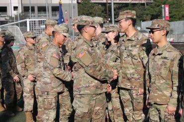 cadets shaking hands