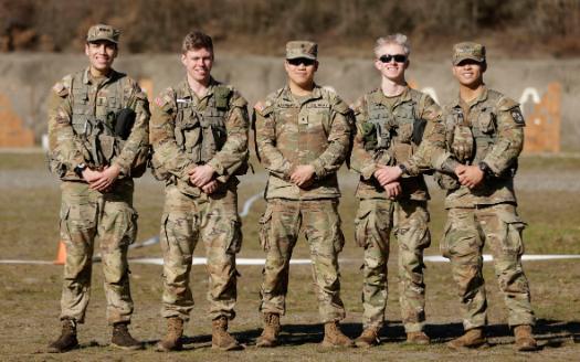 Five male cadets in Army greens facing camera