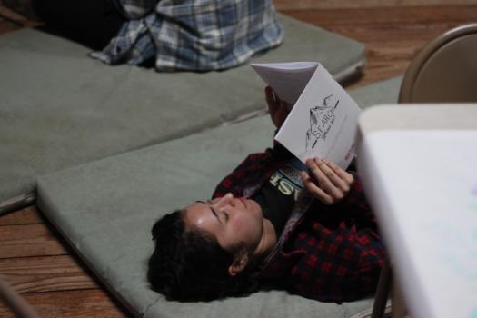 A student reads their journal during Search.