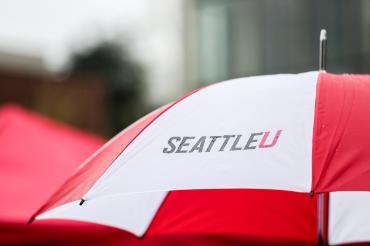 Image of umbrella with seattle U logo