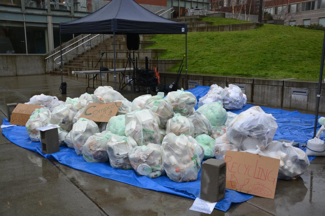 The bags have been divided into trash, compost and recycling