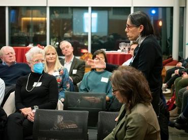 Professor Marissa Olivares speaks with the audience at an event