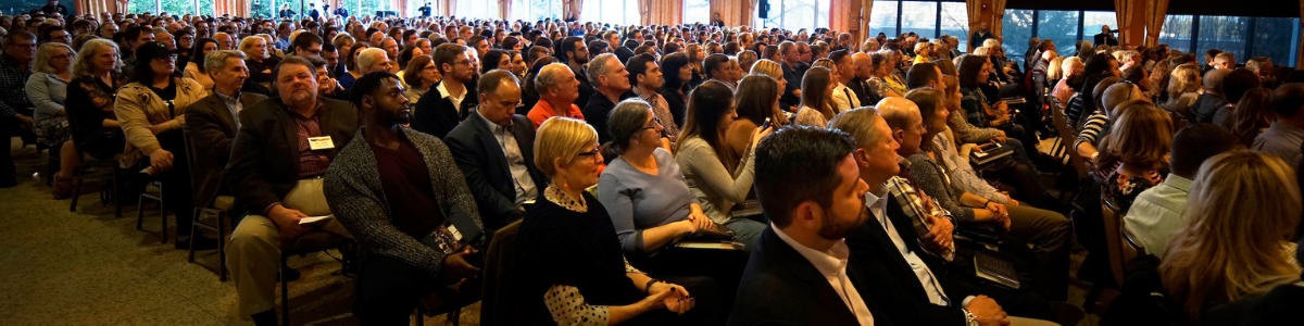 Audience members at event