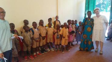 Dr. Gabriella Y Muhs with students and teachers in Guinea