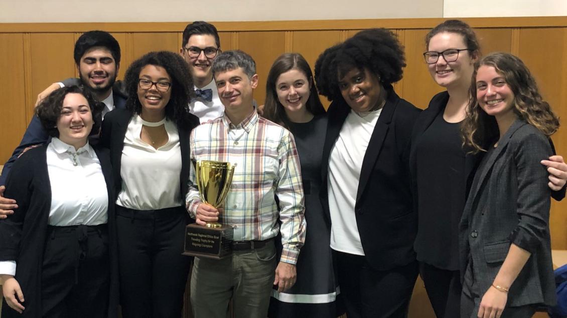 Students and coach of the Ethics Bowl Team