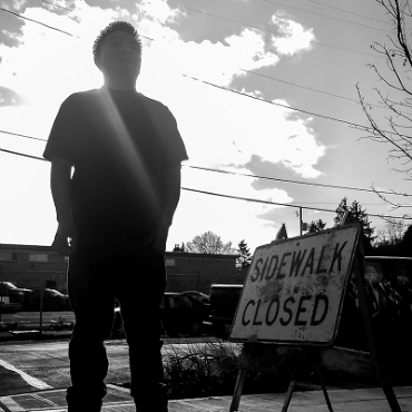 Artwork: sidewalk closed, photo by John Leota