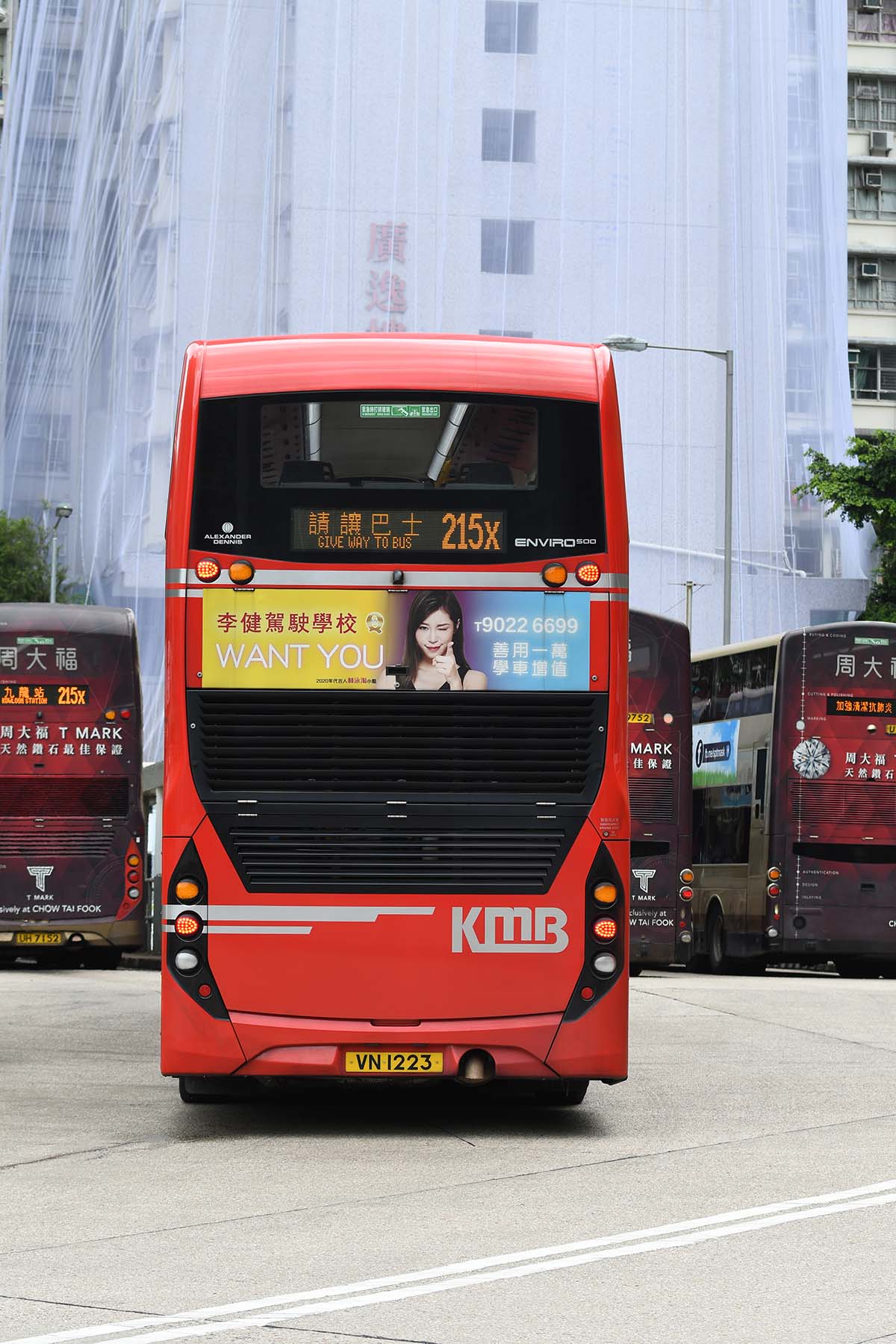 photograph of the rear of a double decker bus