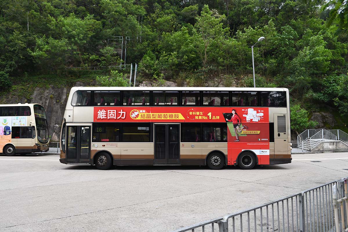 photograph of the side of a double decker bus