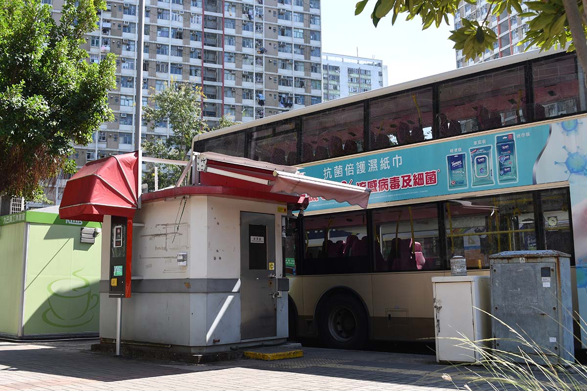 photograph of a double decker bus in a city