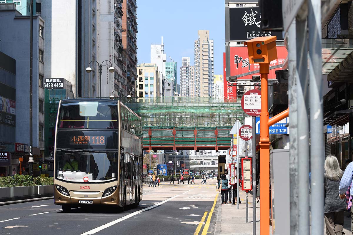 photograph of a bus in a city