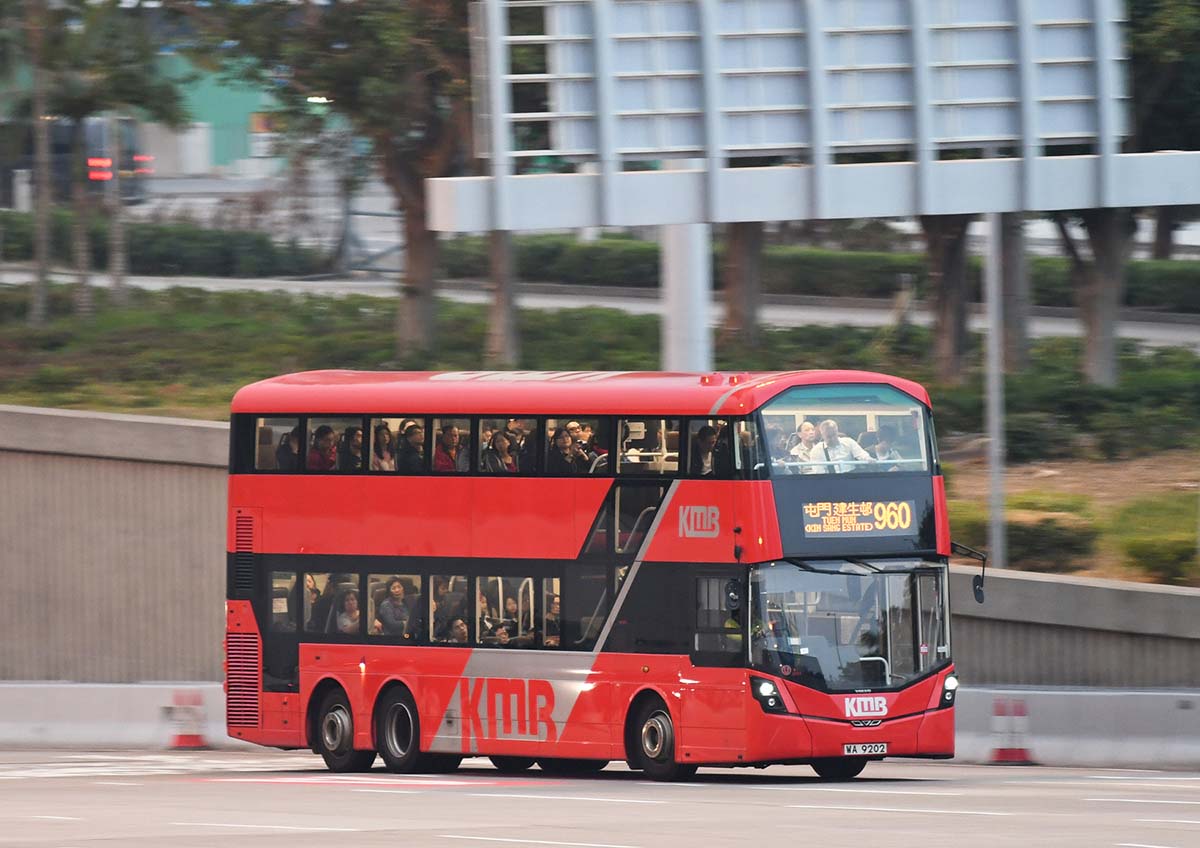 photograph of a bus in a city