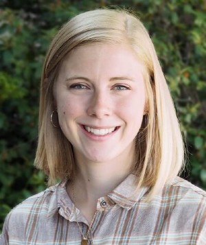 Megan Bogart with leafy background