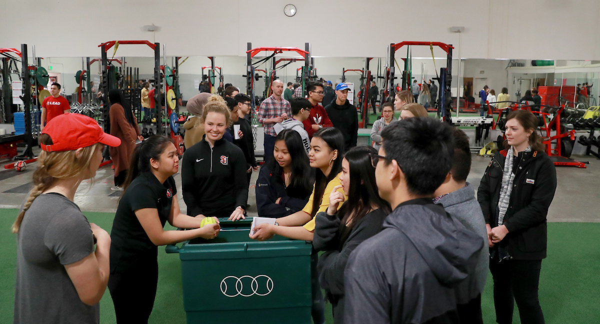 Students talk during demonstration at 2019 Kinesiology Biomechanics Fair