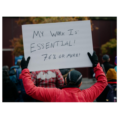 Human services workers gather in the Seattle City Hall plaza to rally for increased wages that will cover inflation, at a minimum, on Tuesday, November 8, 2022. (from Crosscut)