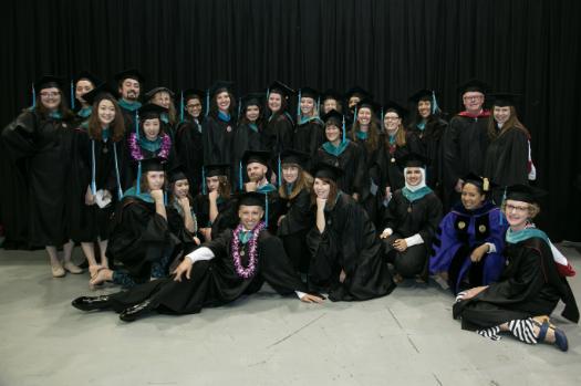 The MFA Class of 2019 in their graduation regalia.