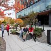 A picture of students sitting outside of the Sinegal Center for Science and Innovation