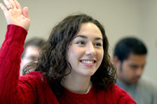 Lady raises hand in class