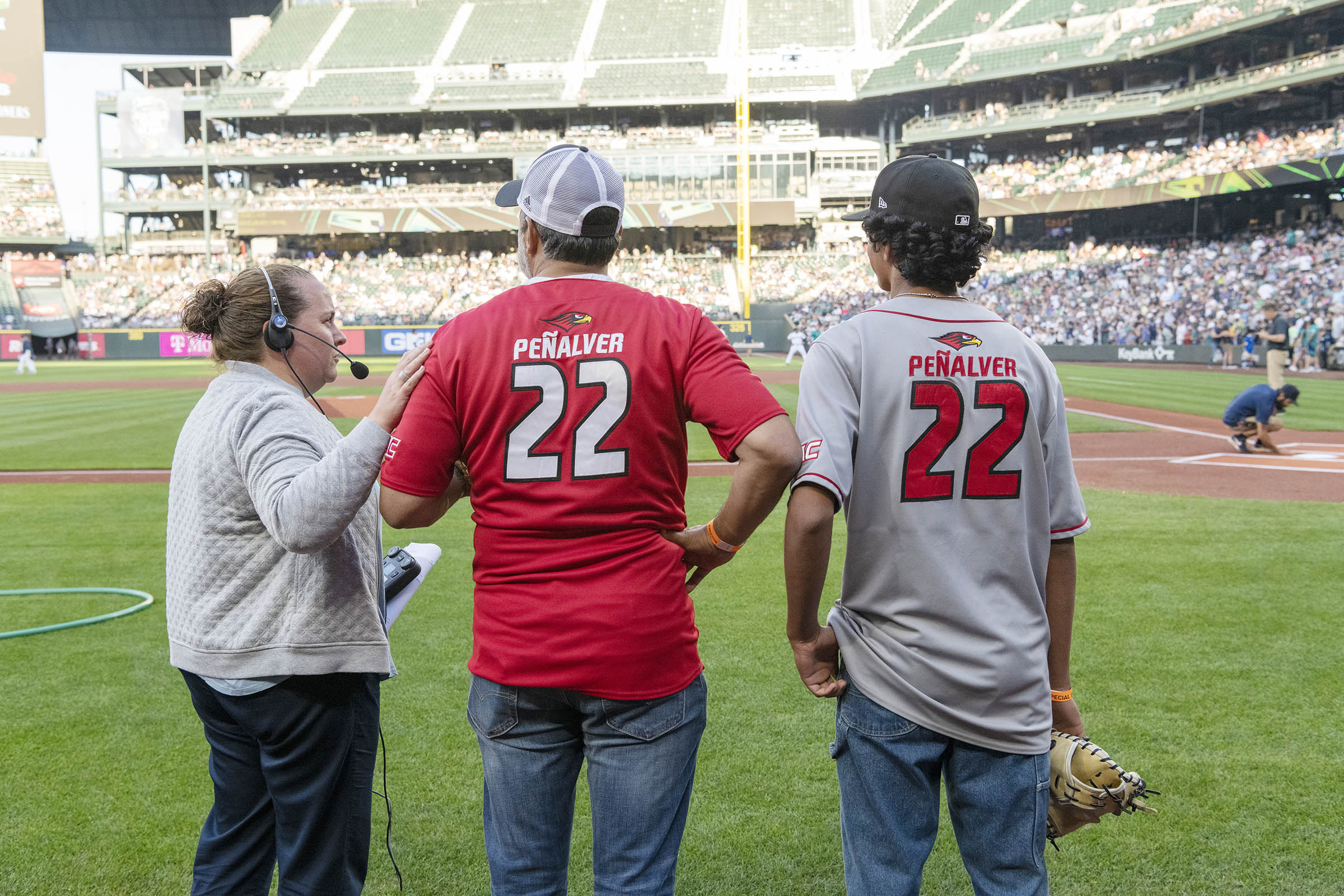 Eduardo and son Jai prepare for the first pitch.