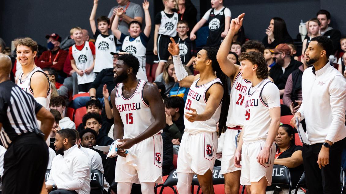 Men's basketball celebrates win