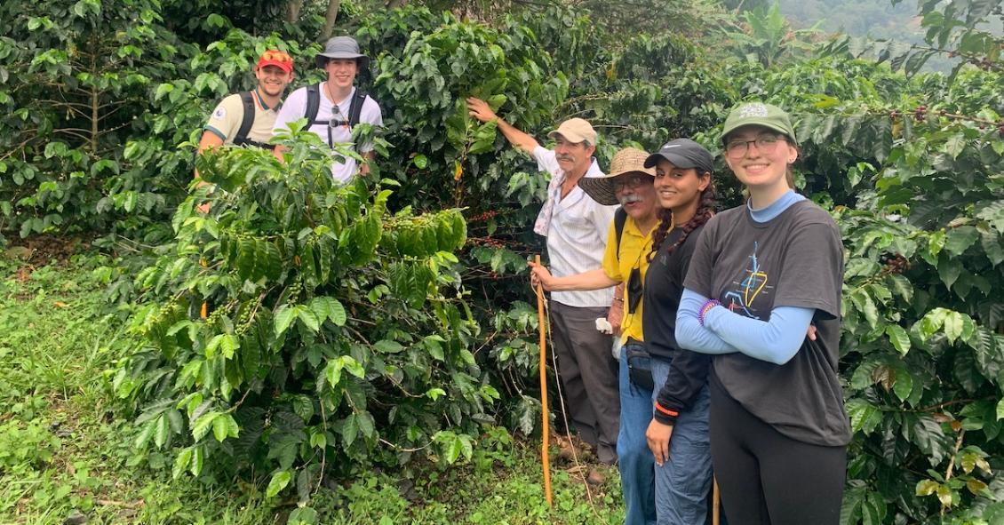 Students with a coffee farmer in Colombia.