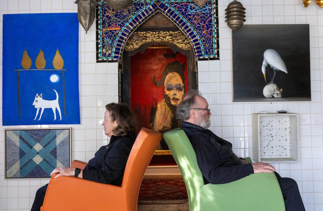 Nancy Mee and Dennis Evans in artsy chair at home