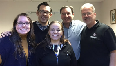 Group photo of 5 members of the International Retreat Team