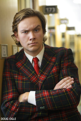 James Cashman in a red plaid sport coat