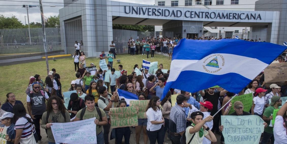 Photo in front of UCA in Managua in 2018