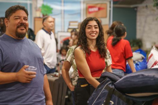 student smiling with parent move in