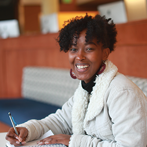 Smiling student studying