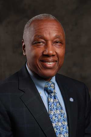 Photo of John H. Vassall, MD (co-chair)