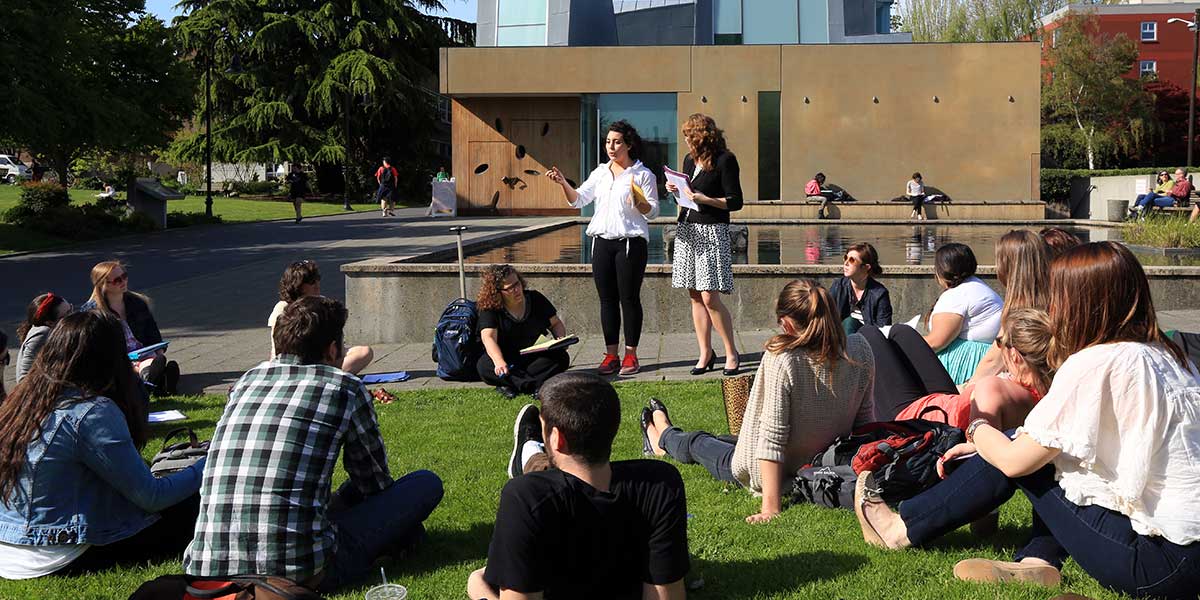 Class on the grass in front of The Chapel