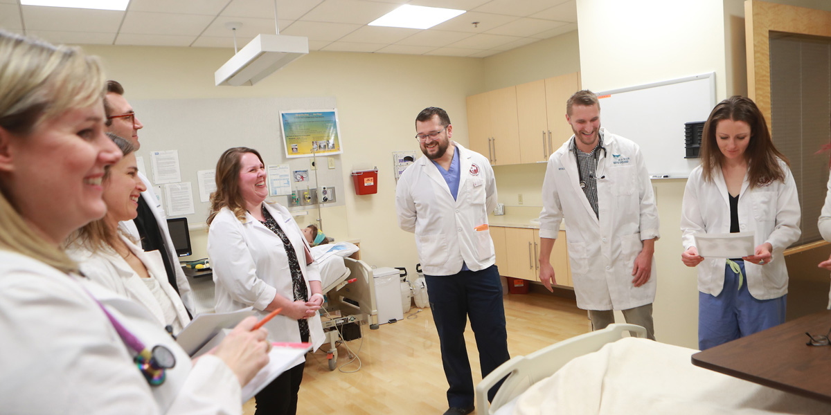 a group of students at a nursing lab