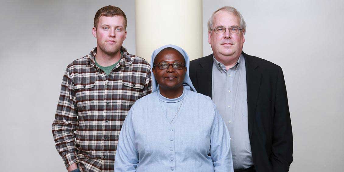 Pictured l-r: Andrew McAferty, '16, Sister Elizabeth Namazzi and Jim Dooley, '76