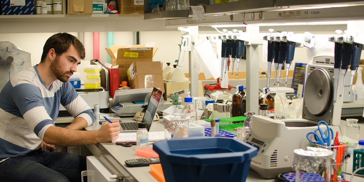 a student conducting research in a lab