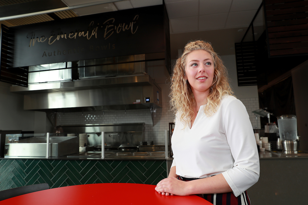 Brianna Ballard, pictured inside one of Chartwell's dining spaces, is advocating for the link between what we eat and how we create a better world for all.