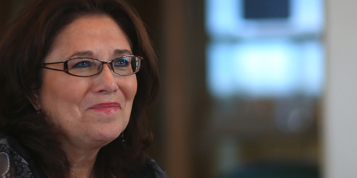 Image of Dr. Jeanette Rodriguez sitting down and looking away from camera.