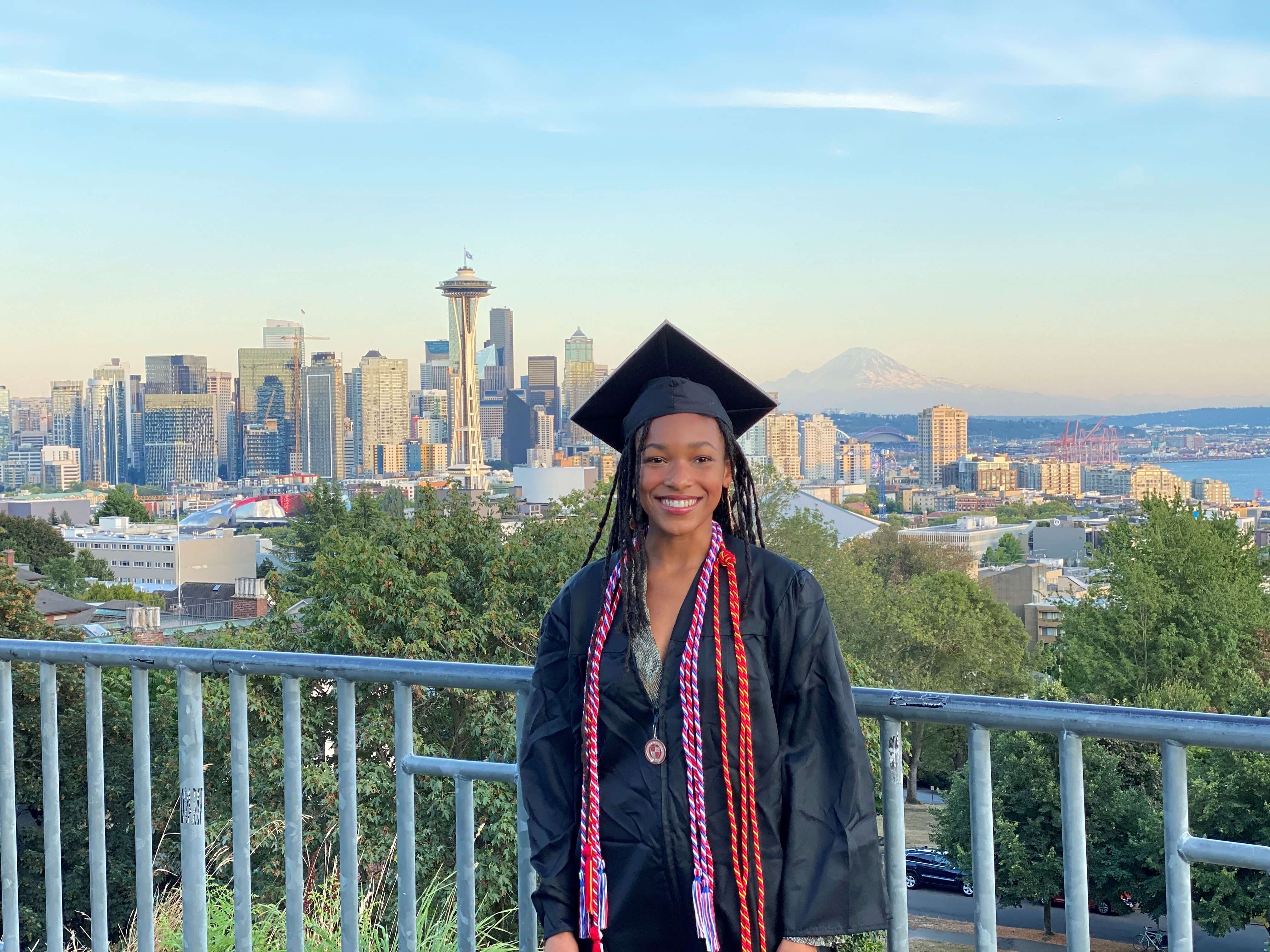 London Jones in graduation cap and gown.